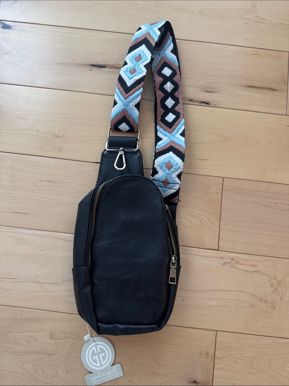 Black Leather Crossbody Sling Bag with Patterned Strap